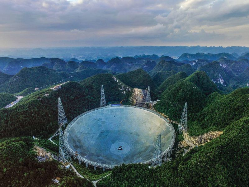 A result of the worldwide effort started by the 1993 International Union of Radio Science conference to build the next generation of radio telescope, the FAST project began construction in 2011, and was completed in September 2016